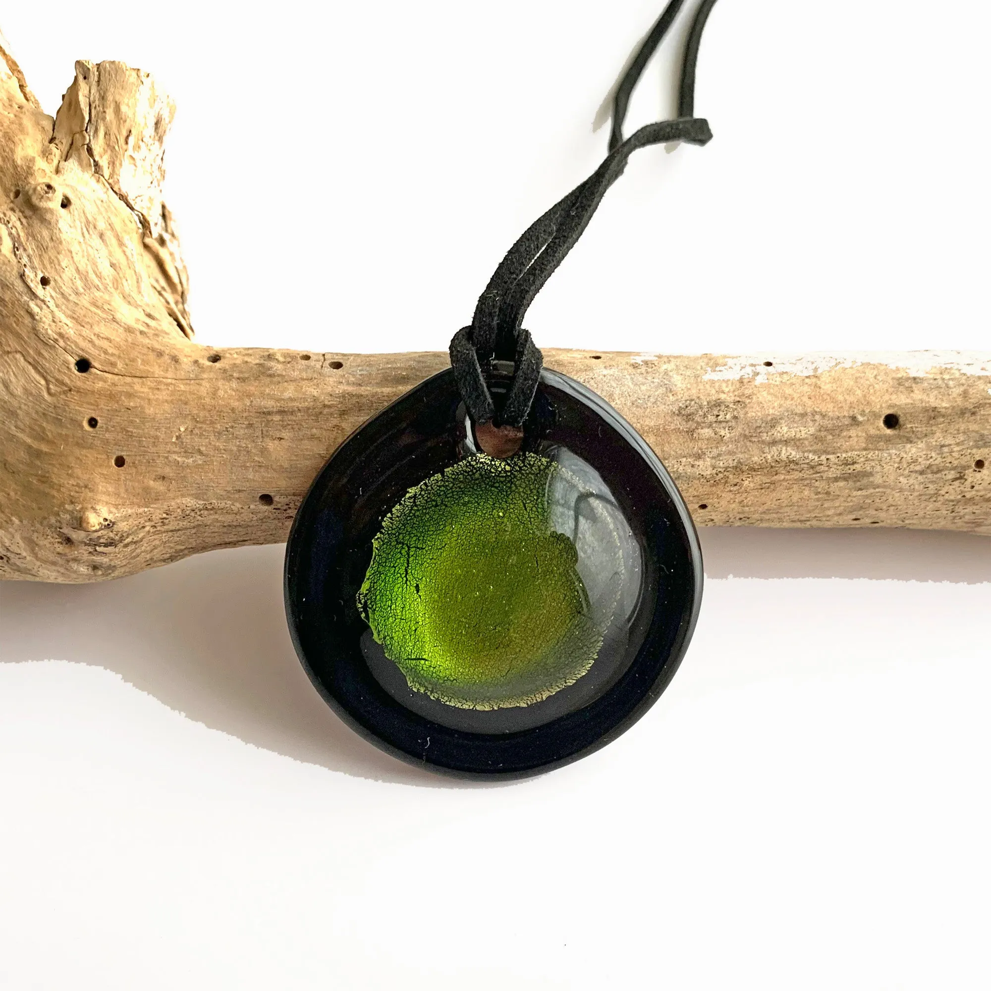 Necklace with light green and silver on black Murano glass near circular large dome pendant